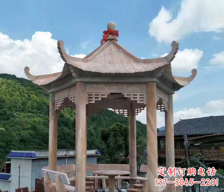 漳州一流的公园晚霞红六角石雕凉亭