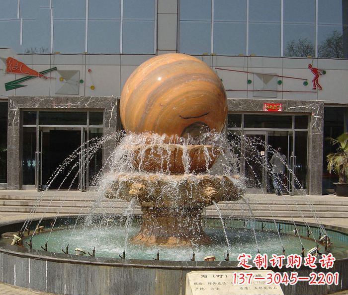 漳州石来运转球晚霞红风水球石雕