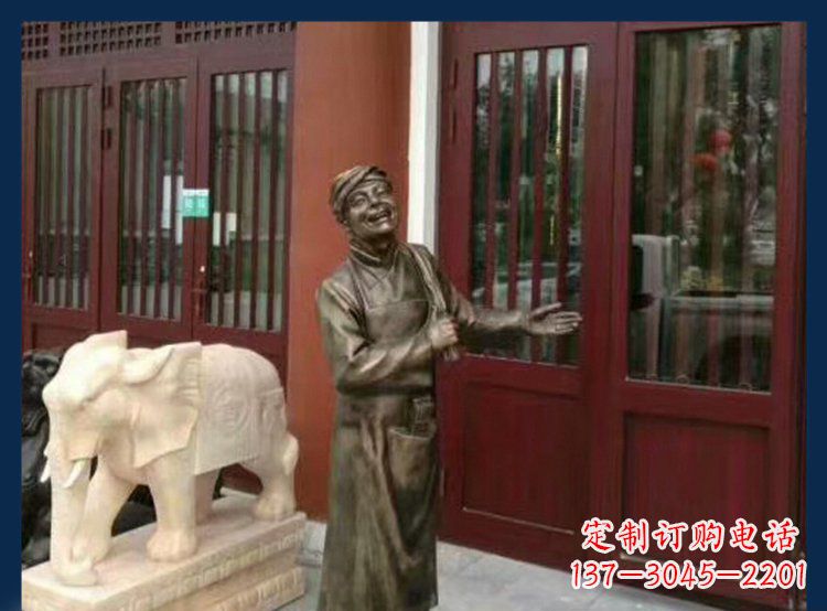 漳州铜雕店小二酒店迎宾人物雕塑