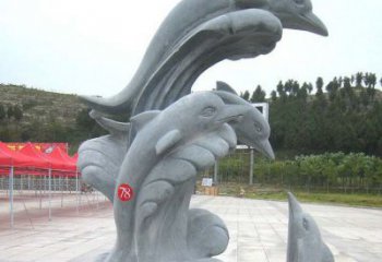 漳州青石海豚雕塑由中领雕塑制作，是一款以海豚…