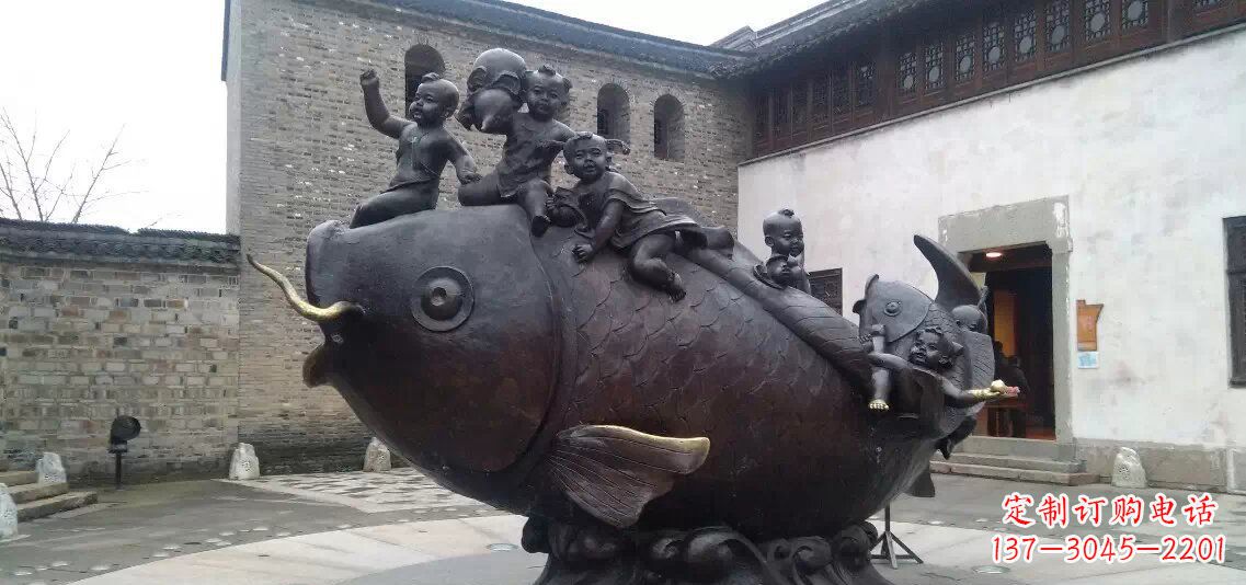漳州小孩骑鱼铜雕