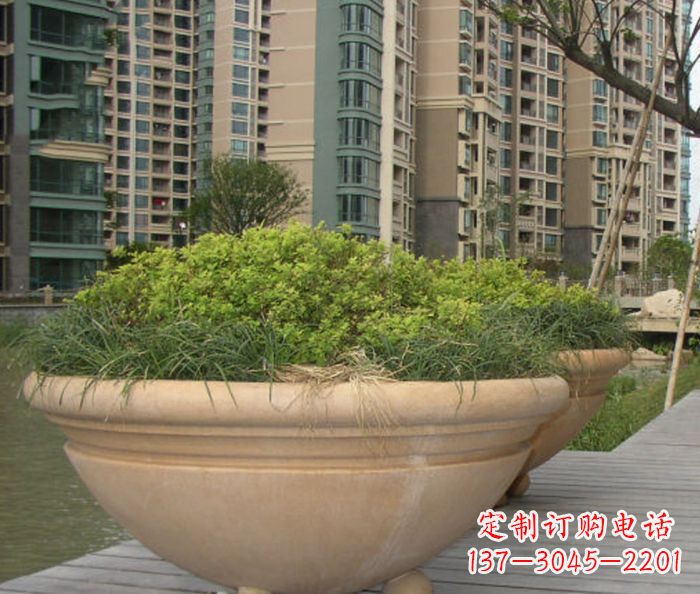 漳州小区景观晚霞红花盆石雕