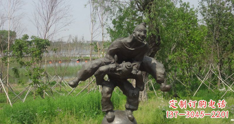 漳州园林站在球上面跳山羊的人物景观铜雕